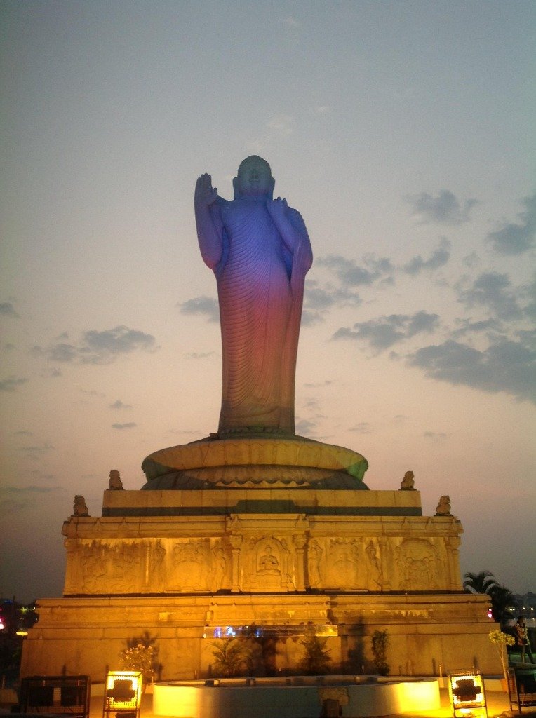 Monolithic Buddha statue illuminated at Hussain Sagar
