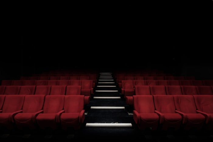 Red cinema seating evoking Ramoji Film City